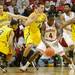 Michigan sophomore Trey Burke, freshman Nik Stauskas, freshman Mitch McGary and freshman Glenn Robinson III surround Indiana junior Victor Oladipo during the second half at Assembly Hall on Saturday, Feb. 2 in Bloomington, Ind. Melanie Maxwell I AnnArbor.com